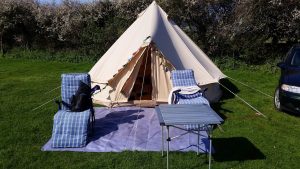 A bell tent and sun loungers